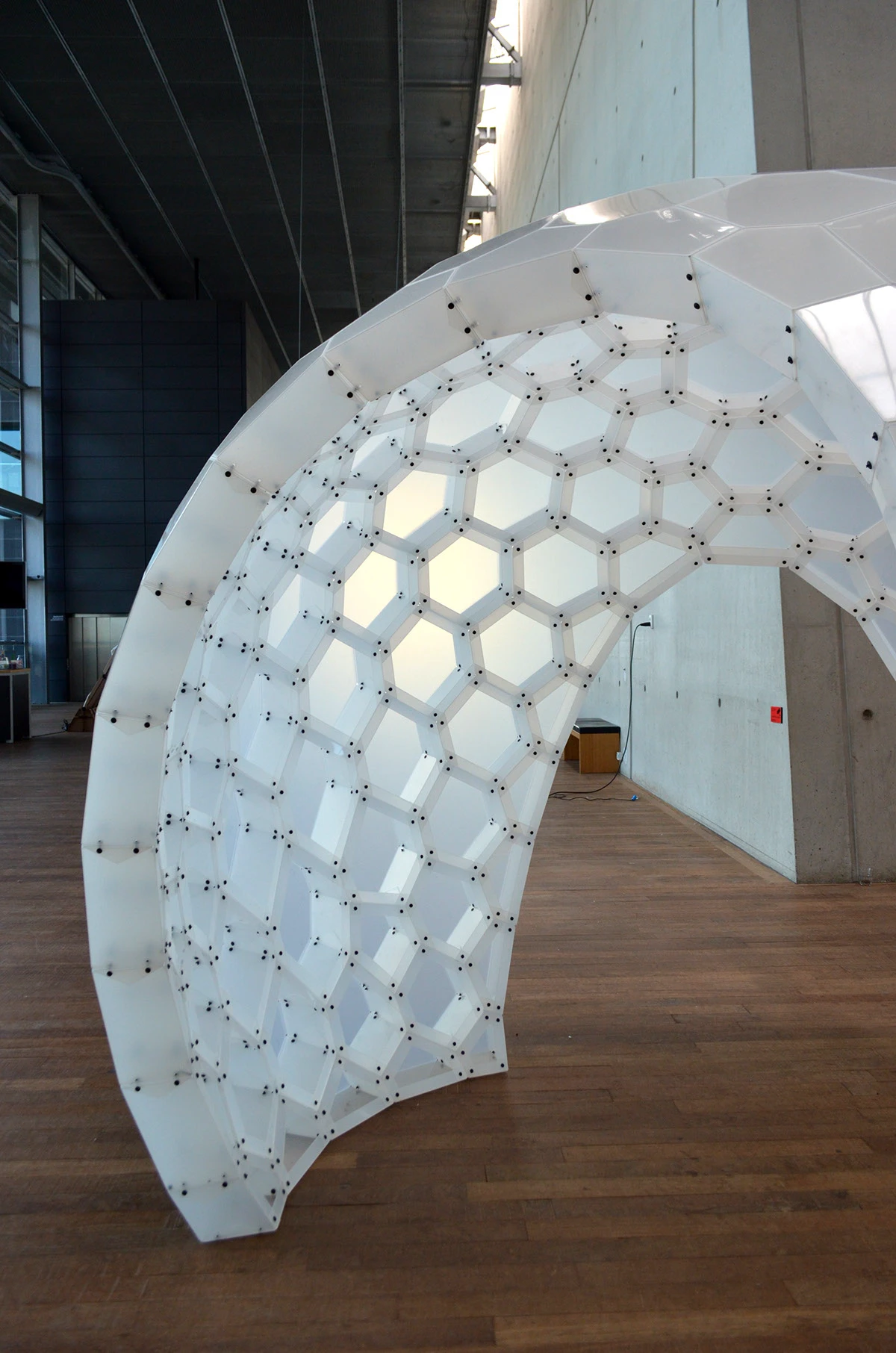 Detail of the assembled PolyShell pavilion and its translucent inner surface.